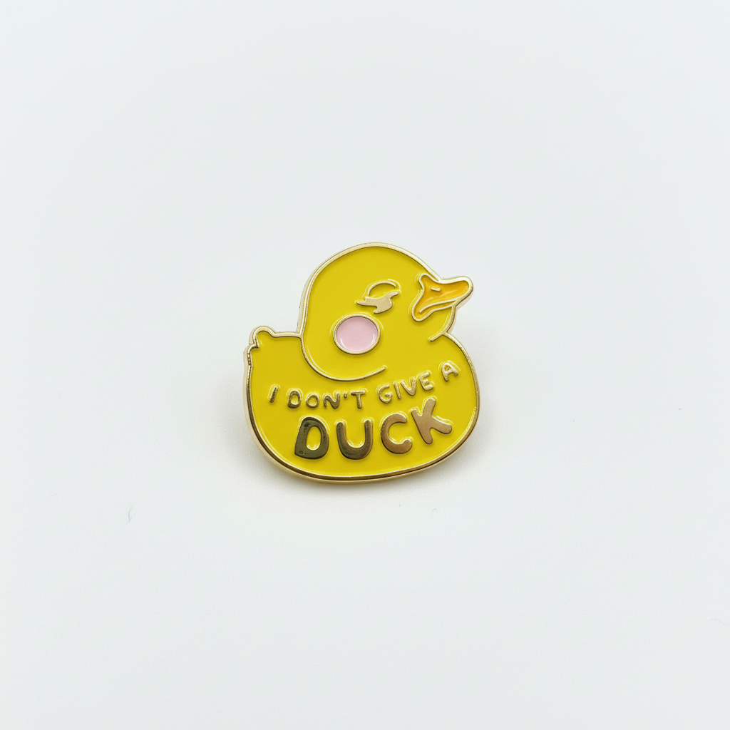 Pin’s Canard Jaune « I don’t give a Duck »